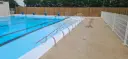 main courante piscine déportée avec fourreaux inox 316L